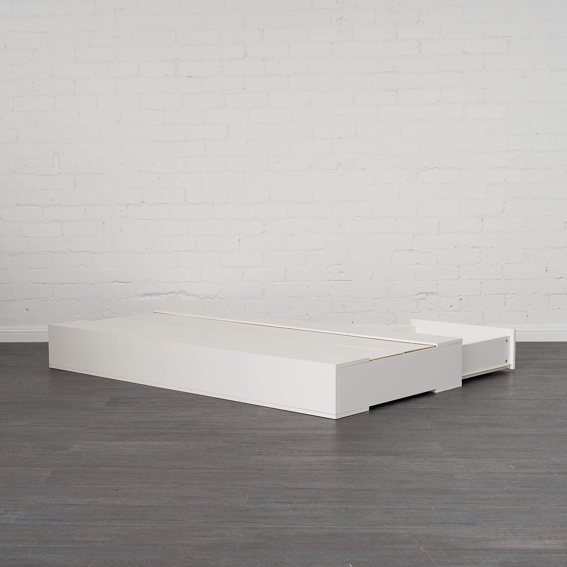 White under bed storage drawer unit, rear view.