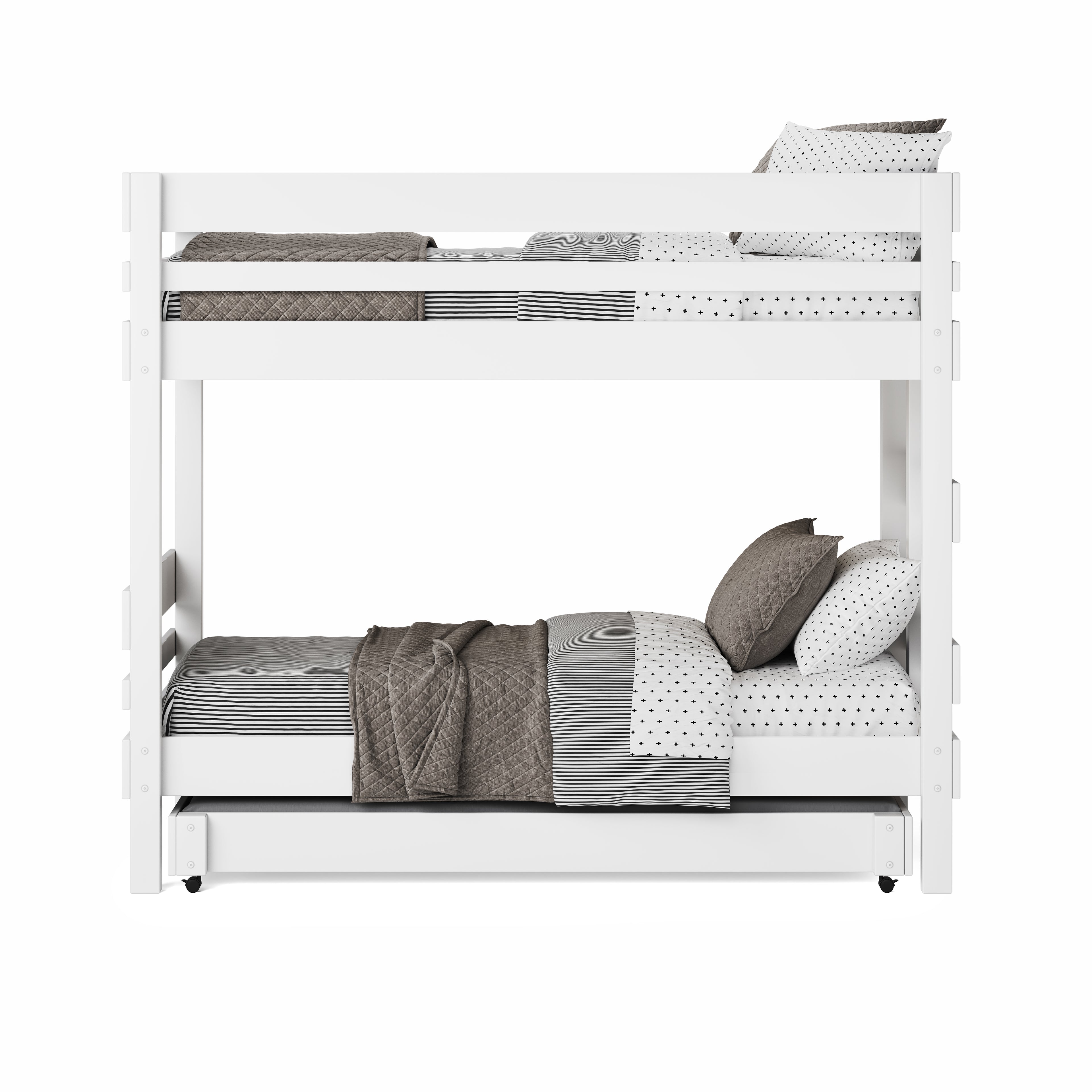 White wooden bunk bed with guardrails, bedding in neutral tones, and trundle drawer below.