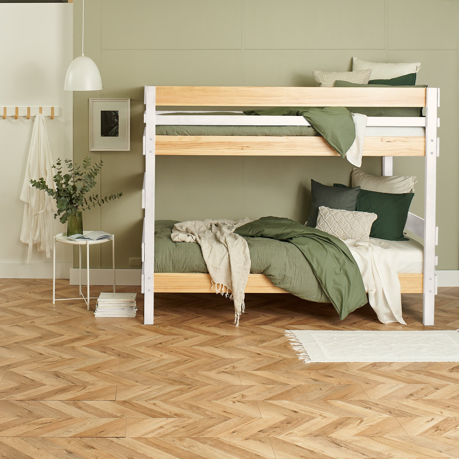 White and natural wood bunk bed with green bedding in modern bedroom setting.