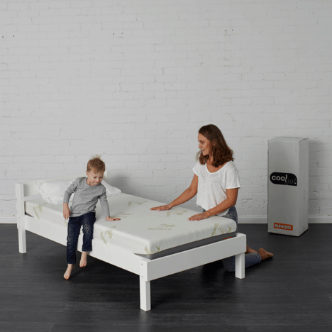 kid playing on bunk bed mattress