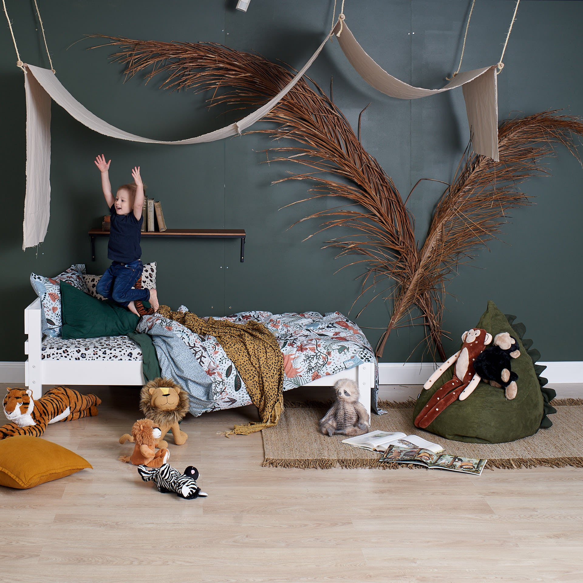 Bunk Bed safety standards testing, pictured white single bed with happy kid jumping