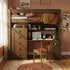 Wooden loft bed with desk and chair in a room with a window and wall decorations.