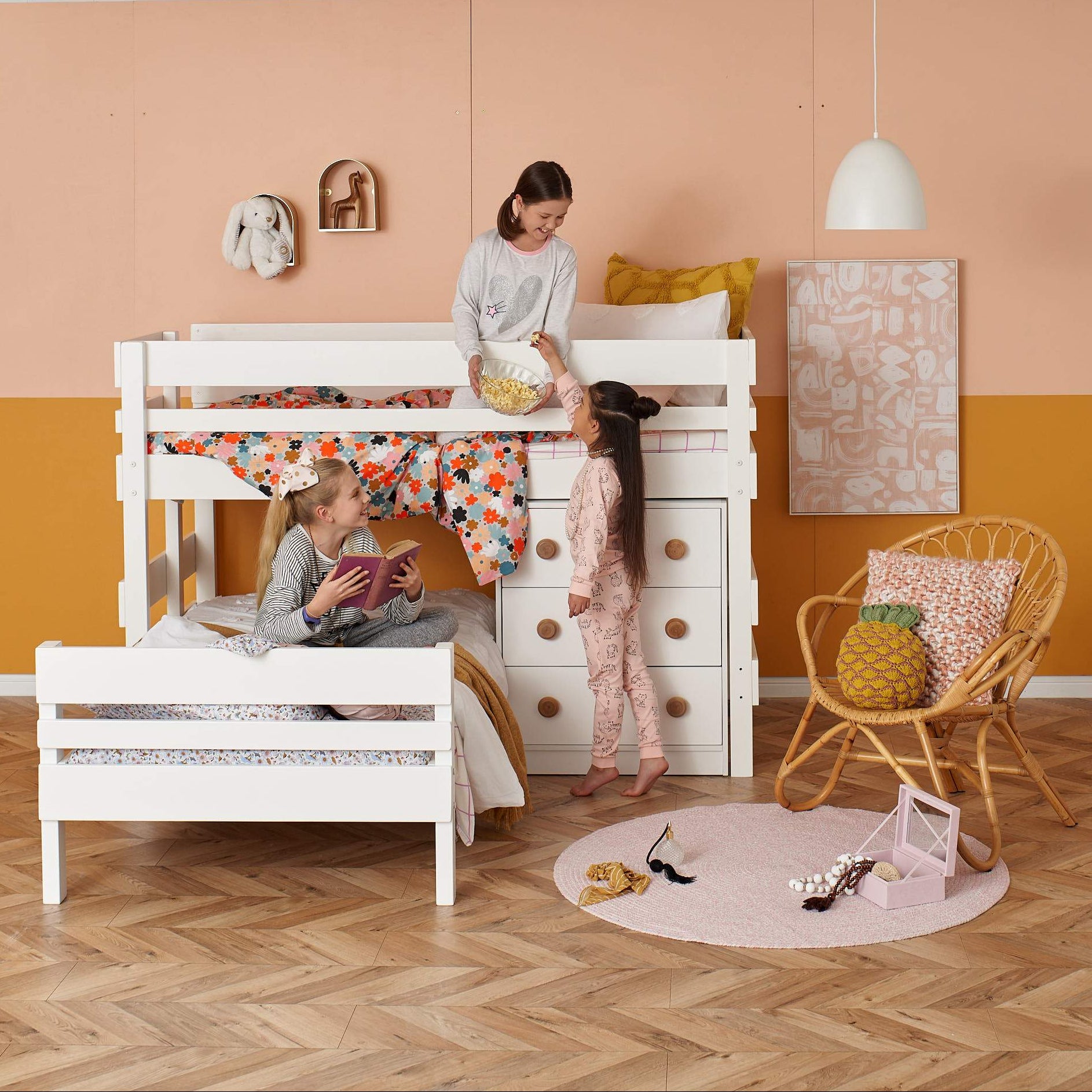 Kids playing on a Bunkers low-height corner bunk bed