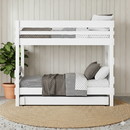 White wooden bunk bed with ladder, guardrails, and trundle drawer on woven round rug.
