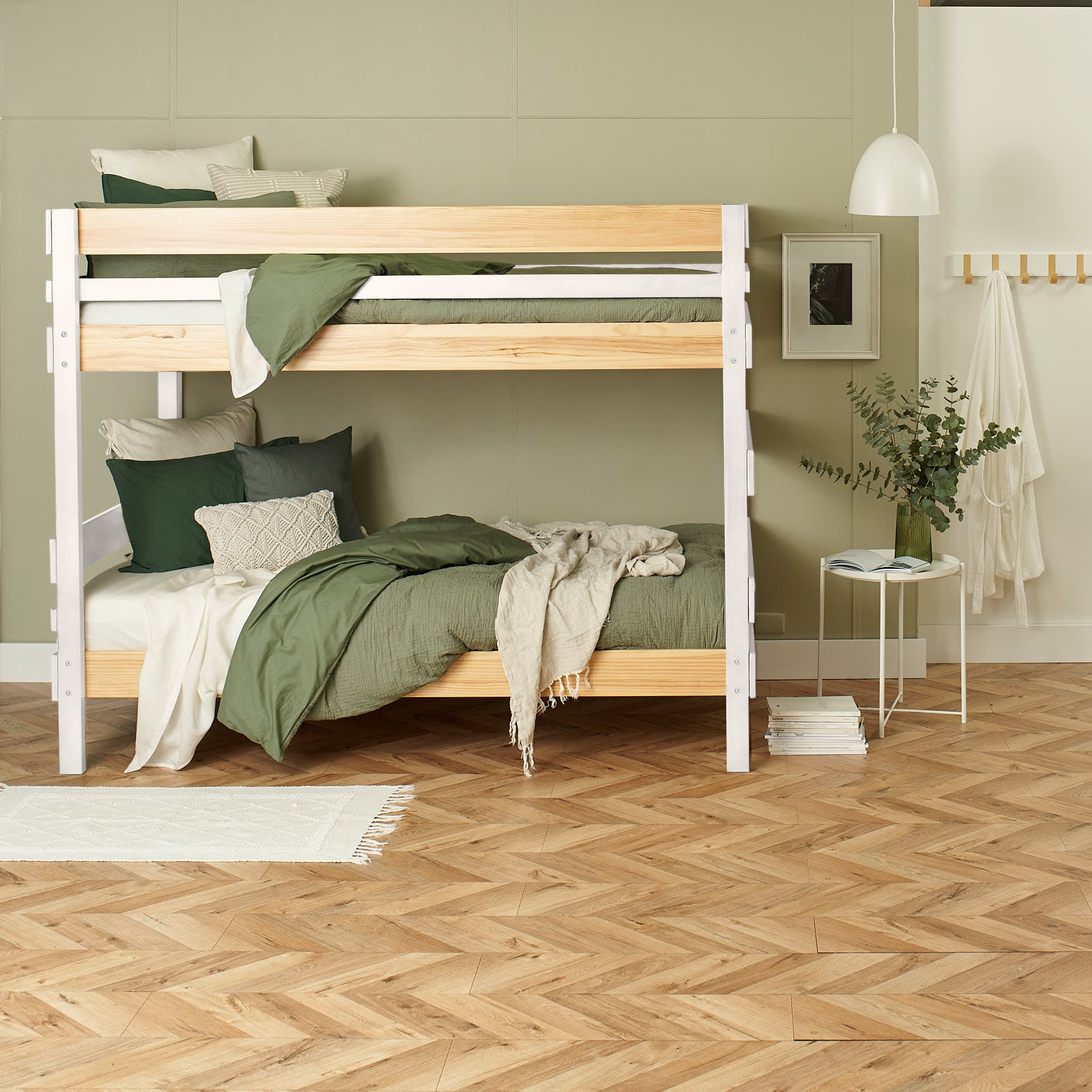 White and natural wood bunk bed with green bedding in modern bedroom setting.