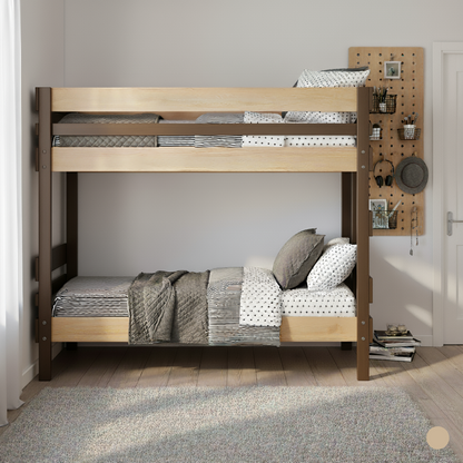 Native elm bunk bed with king single mattresses, patterned bedding, and gray pillows in a minimal room.