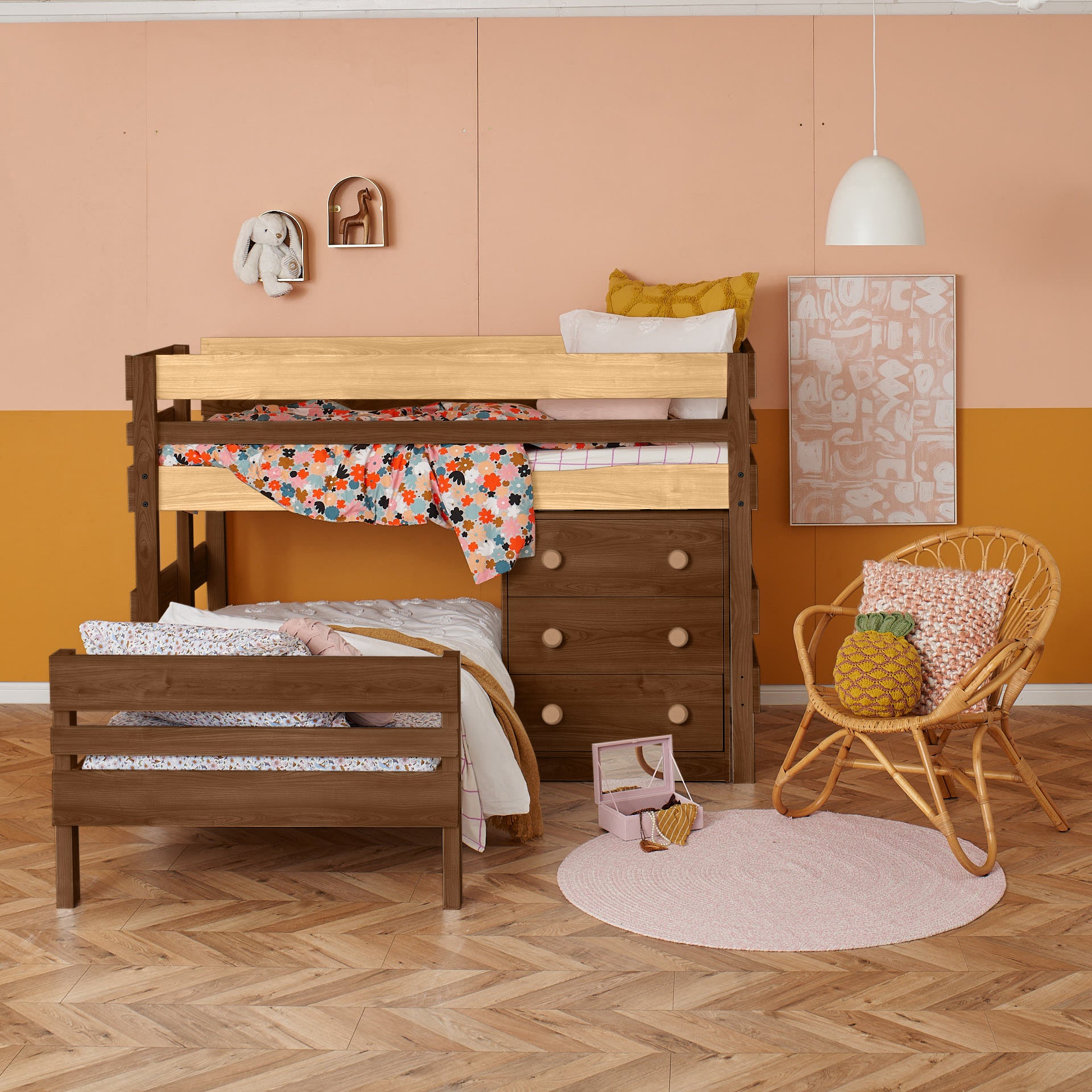 Low height corner bunk bed in dark wood with ladder and storage drawers, colorful bedding, cozy nursery setup.