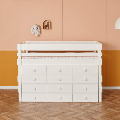 close up low height loft bed with incredible storage in white finish