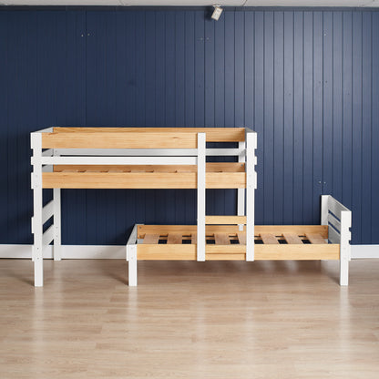 Low height long-wall bunk bed in white and natural elm with guardrails and ladder on light wood floor.