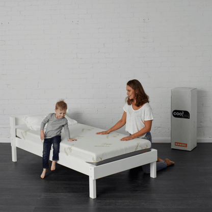 kid playing on bunk bed mattress