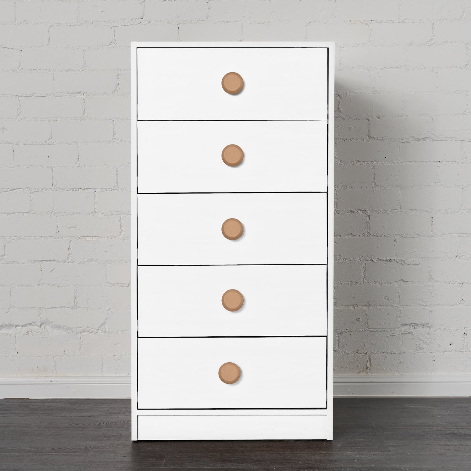 White mid-line chest with five drawers and round wooden knobs, designed for bunk or loft bed spaces.