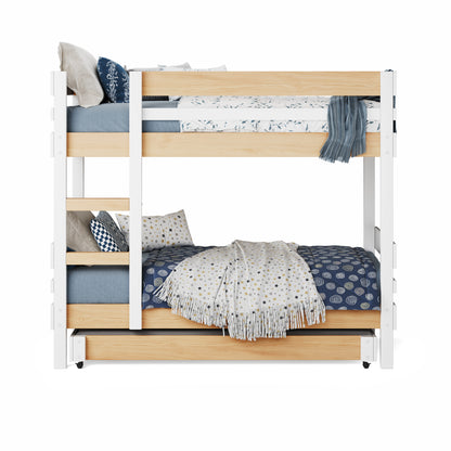 White and natural wood bunk bed with side ladder access and patterned blue bedding.