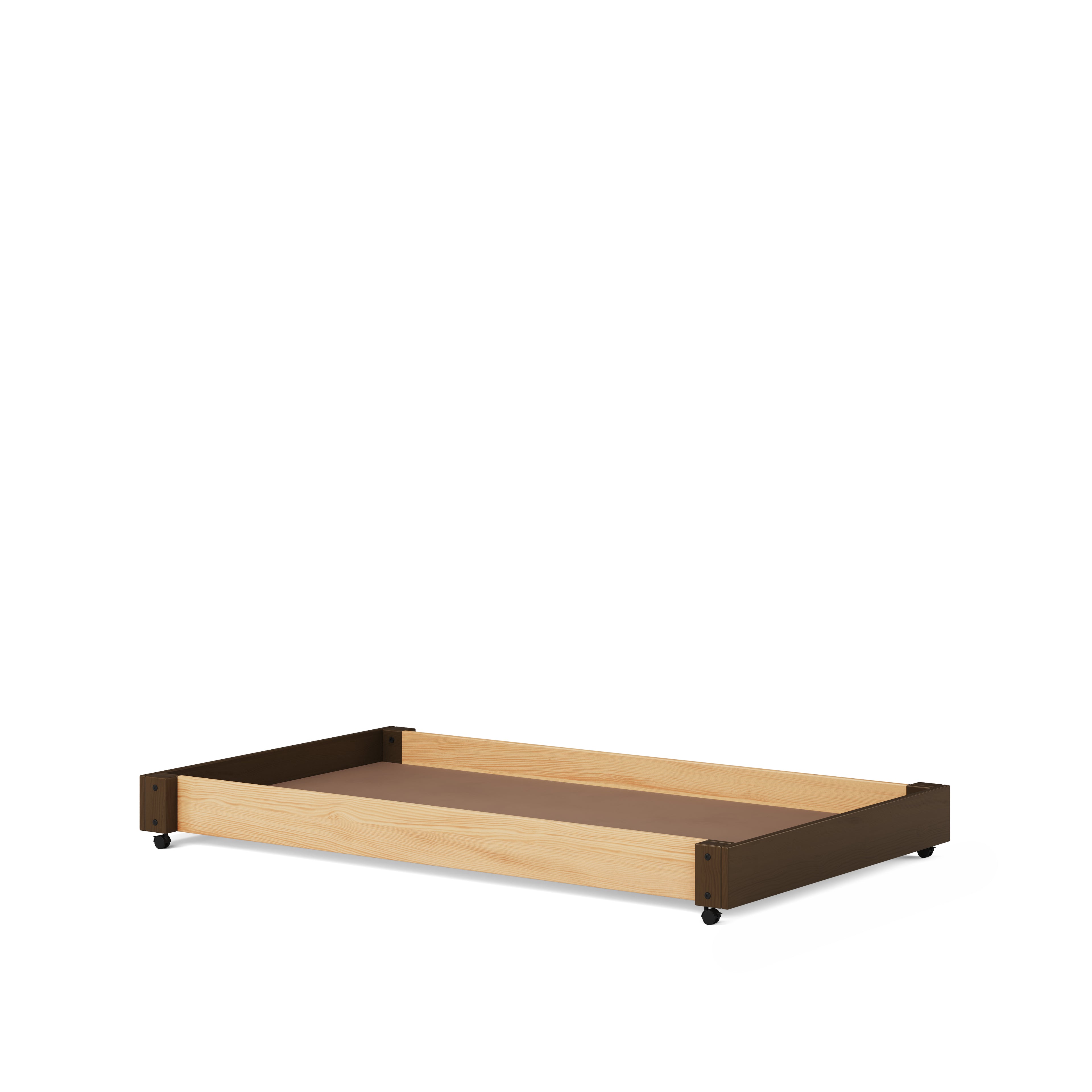 Low-profile trundle bed frame in natural elm wood with dark brown accents on casters.
