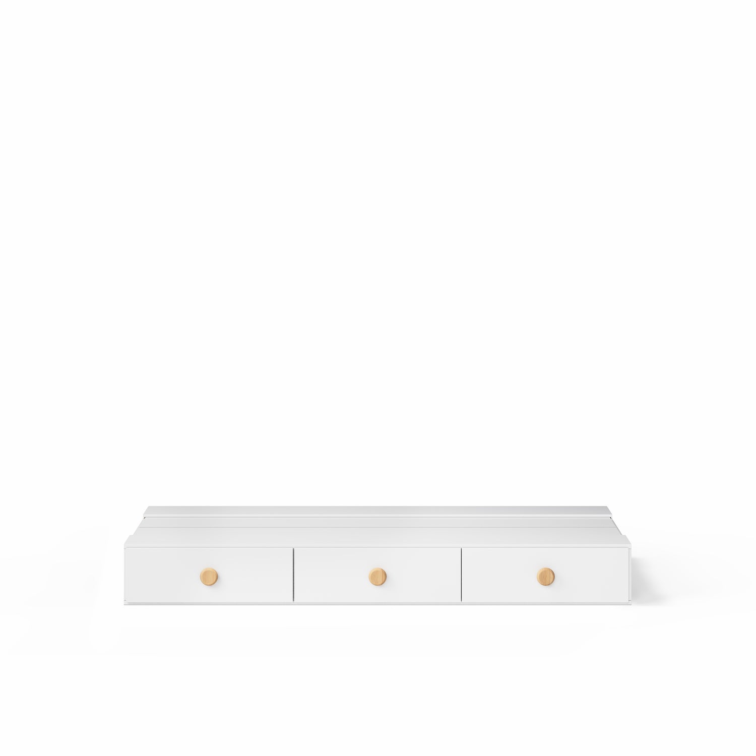 White under bed drawer unit with three compartments and round wooden knobs for loft or bunk beds.