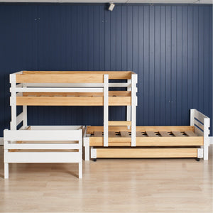 Low height 4 bed bunk. Offest bunk bed plus extra standard bed, with versatile trundle for extra sleeping or storage. Shown in Nordic, white with clear pine.