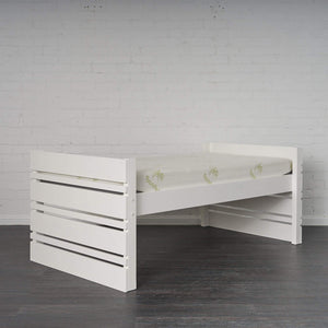 White Captain Bed pictured alone set at higher setting. Angled view to show side and end frame.
