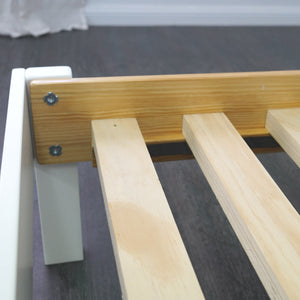 Double bed solid slat base close up