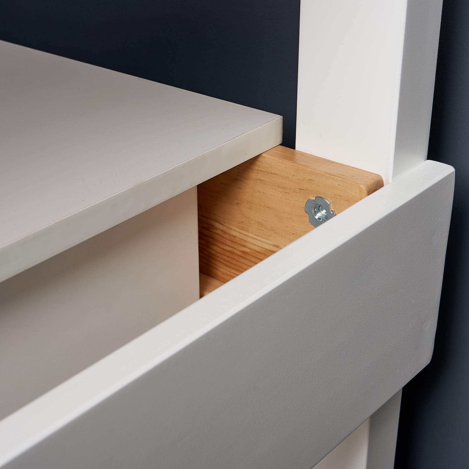 Close up shot desk on loft bed rail