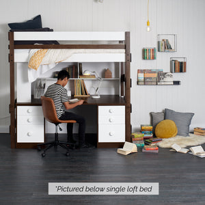 Teenager at large study desk below loft bed with storage